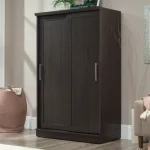 A dark brown wardrobe with two sliding doors.