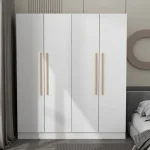 A tall white wardrobe with four doors and gold-colored handles.