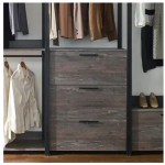 Modern and minimalist walk in closet with a sleek design and ample storage space.