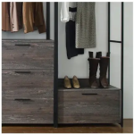 well-organized and functional walk-in closet for storing and displaying clothing.